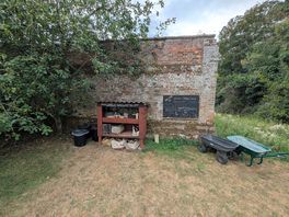Little shop selling firewood, local honey, marshmallows etc.