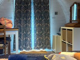 The inside of the cabin from bed view