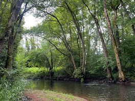 The river yonne that skirts the site, with well maintained paths for guests to follow