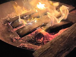 Sitting around a fire pit is the epitome of camping in nature