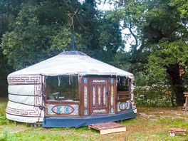 Outdside the white yurt