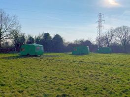 Camping field surrounded by trees