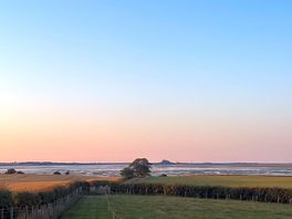 View from path next to campsite towards lindisfarne