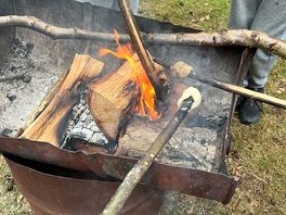 Bushcraft food - making bread over a fire