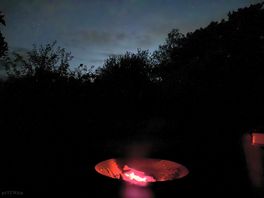 Fire pit under a starry sky