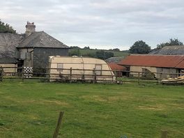 Farmhouse the site belongs to