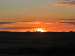 Enjoying watching the sunset.
