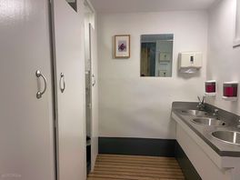 Ladies toilets and hand wash area which is separate from showers.