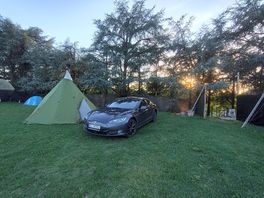 Place for car and tent.