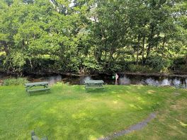 Tent site next to stream.