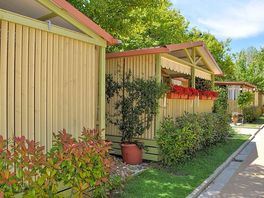 Three-bed cabins with pretty landscaping