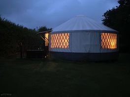 Oak yurt at night