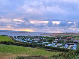 View from the top of the hill of the camp site and chesil beach