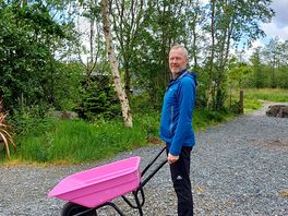 Lovely pink wheelbarrows for transporting your kit to your pitch.
