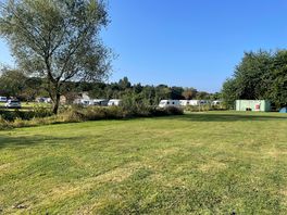 Second field with older toilet block