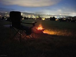 Nighttime view over the local villages nestled in the hills