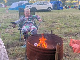 Keeping warm by the fire.