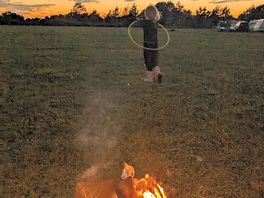 Camp fire at sunset