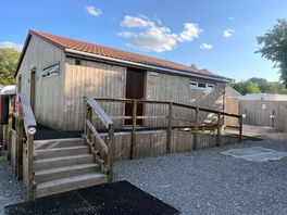 Outside toilet/shower block. pot washing room is also in this building