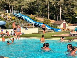 Swimming pool with water slides