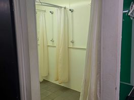 Ladies shower. mouldy curtains again.