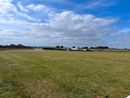 View across the camping field towards toilet block