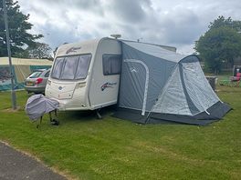 This photo of my caravan and the pitch was lovely and clean and very level