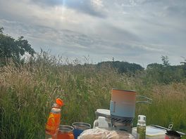 Breakfast time. this is the view behind our van, looking away from the camping field.