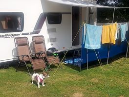 Qyick set up with sun canopy and wind break.