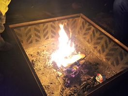 Enjoying shmores on the fire