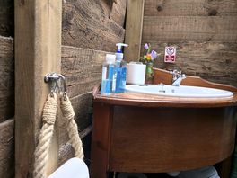 Toilet with sink.