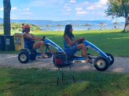 Mom and daughter scooting around on rental buggies