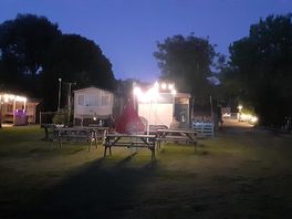Communal area, picnic benches, fire bowl, twinkly lights and chill out!