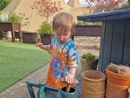 Playing outside of the cafe