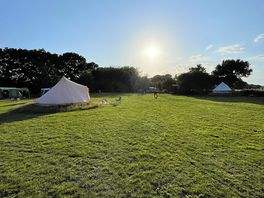 Campsite field at sunset