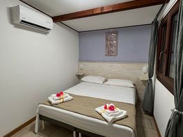 Double bed in bungalow