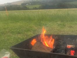 This is the fire pit we hired and the view from our tent.