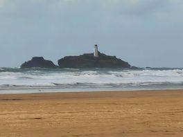 View from the beach out to the lighthouse