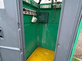 Shower? yes that’s a trench cover being used as the floor