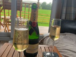 Drinks with the sound of rain on the hut.. peaceful.