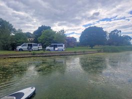 Paddle boarding back to site