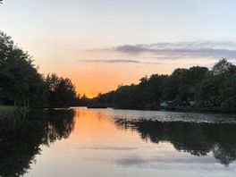Sunset over the beautiful lake.