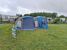 Caravan section behind the fence. my set up infront of the fence.