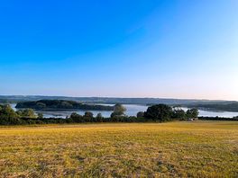 This is a picture of lake view grass pitches at Nesta Valley