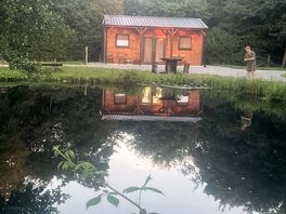 Kingfisher pond and cabin .