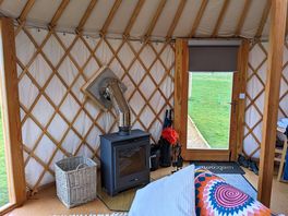 Wood burner for keeping the yurt warm & cosy. kindling, firelighters & logs provided