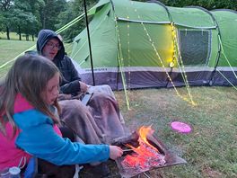 Relaxing by the tent
