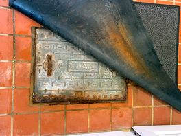 Floor outside one of the showers/toilets.