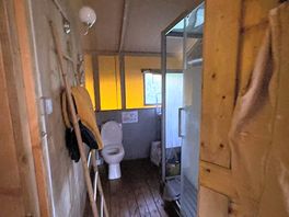 Vie of bathroom from bedroom area