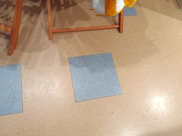 Patches on the floor to cover damage